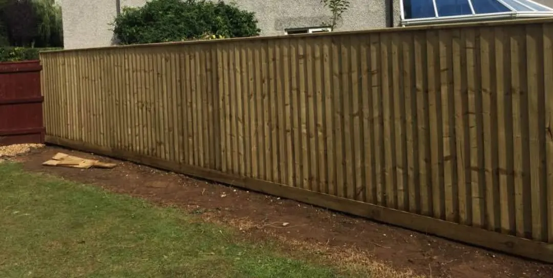 Close board feather edge fence installation in a Newton Abbot garden